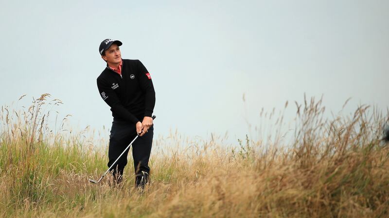 Ireland’s  Paul Dunne  plays his second shot on the third hole during the first round of the British Masters at Close House Golf Club. Photograph: Andrew Redington/Getty Images