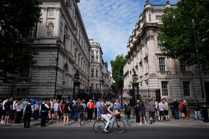 Members of the public outside Downing Street, London. Photograph: Andrew Matthews/PA Wire