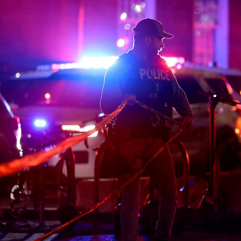 Manhunt under way at Brown University after gunman kills two and wounds nine