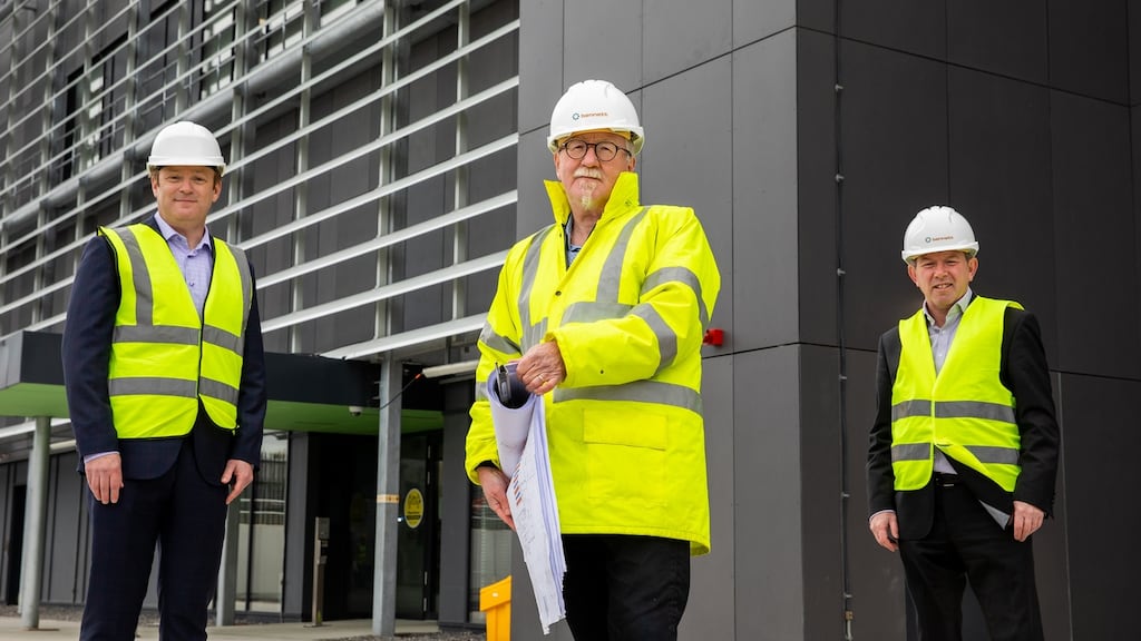 Amazon Web Services Ireland (AWS) country manager Mike Beary pictured with South Dublin County Council  county architect Eddie Conroy and council chief executive Daniel McLoughlin at a briefing outside the new AWS data centre on  district heating in Tallaght, Co Dublin. Photograph: Keith Arkins