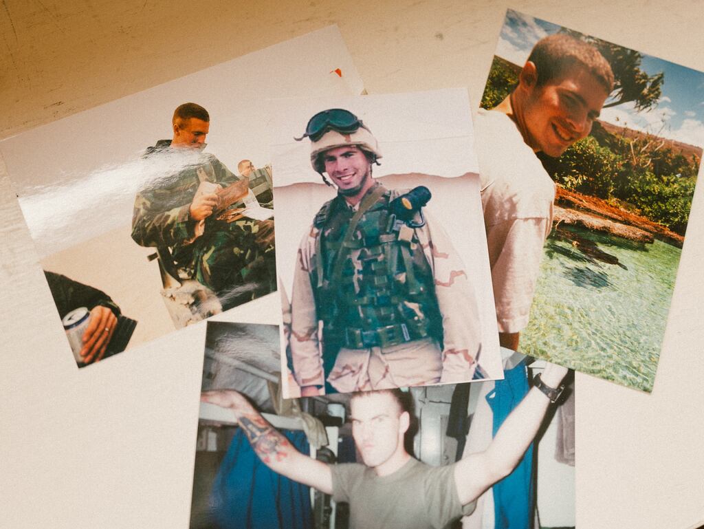 Photographs of Lance Cpl Travis Bradach-Nall at his parent’s home in Oregan. He was killed by a cluster munition left from an American attack in Iraq. More than 100 nations have banned the use of cluster munitions, which scatter tiny grenades, because of the harm they pose, especially to children. But the US, Russia and Ukraine have not. Photograph: Mason Trinca/New York Times