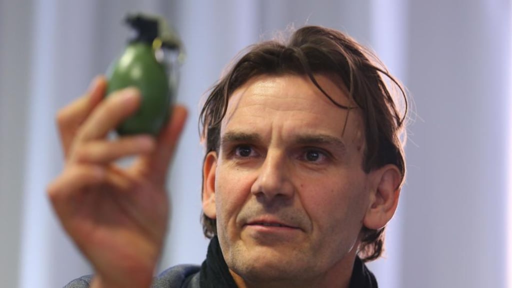 “It’s new that weapons of war are being used”: the recovered M52 hand grenade which had been thrown into a migrant home in Villingen-Schwenningen, Germany. Photograph: Thomas Niedermueller/Getty Images