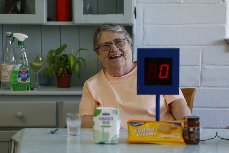 Pat Fenlon getting ready to play bingo at the centre. Photograph: Nick Bradshaw/The Irish Times