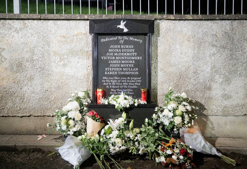 Floral tributes to those killed in the Greysteel attack in Co Derry. Photograph: Liam McBurney/PA Wire