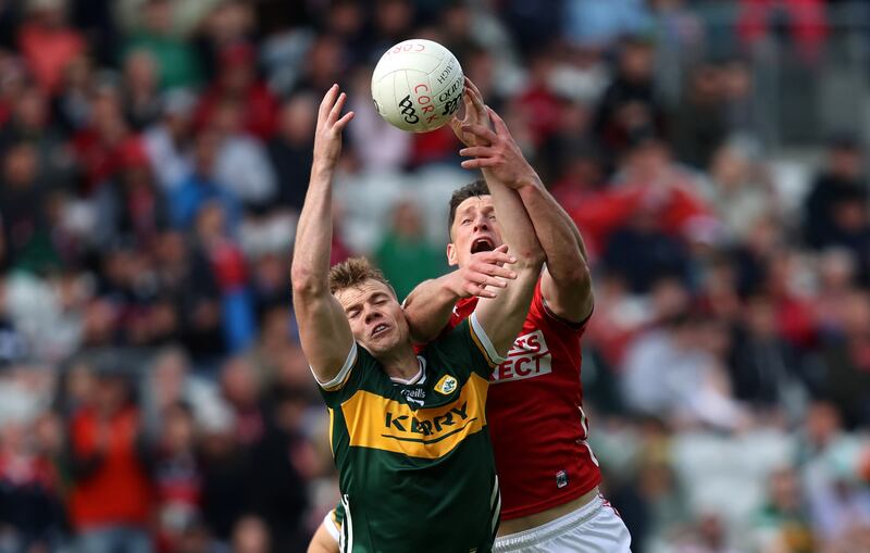 Kerry's Mark O'Shea and Colm O’Callaghan of Cork. Photograph: Bryan Keane/Inpho