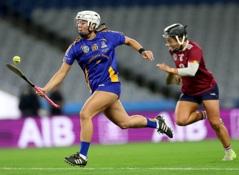 St Finbarr’s Ella Wigginton Barrett gets clear of Athenry's Dervla Higgins. Photograph: James Crombie/Inpho