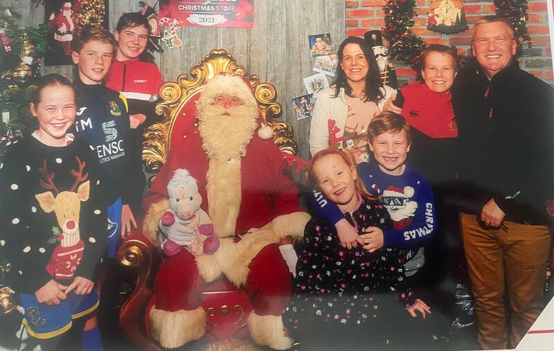 Michael and Sarah with the children and Santa.