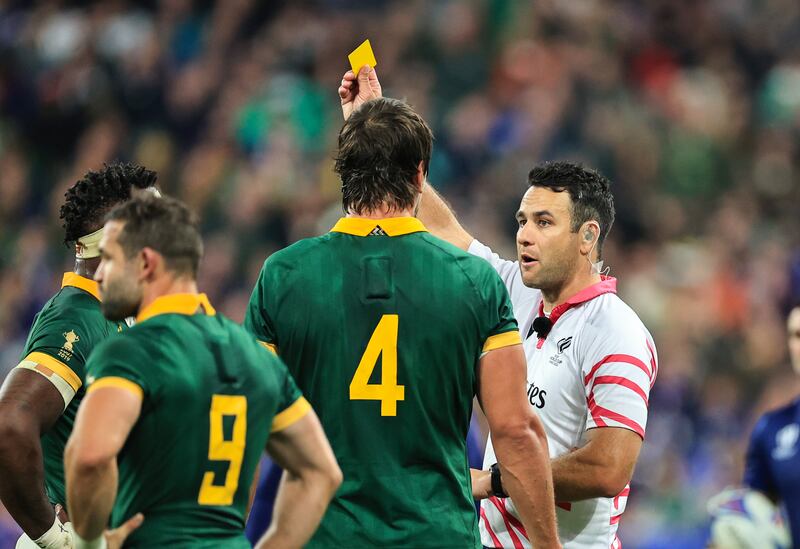 South Africa’s Eben Etzebeth receives a yellow card against France.
Photograph: Billy Stickland/Inpho
