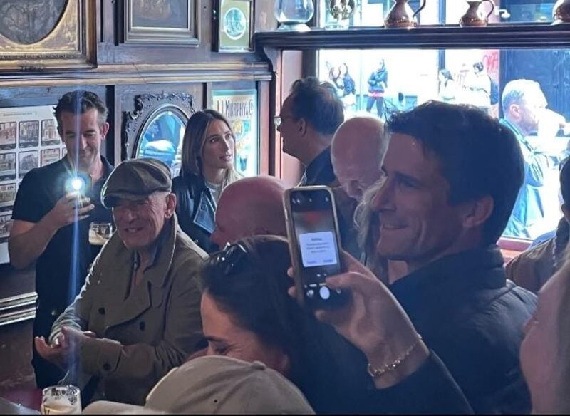 Irish Times reader Bryan Casey (close right) in The Long Hall pub where Bruce Springsteen was having a drink. Photograph: Jodie Peters