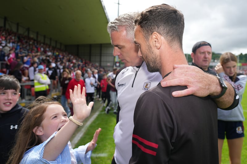 Galway manager Pádraic Joyce with his Down counterpart, Conor Laverty, after Sunday's absorbing All-Ireland SFC preliminary quarter-final at Páirc Esler. Photograph: James Lawlor/Inpho