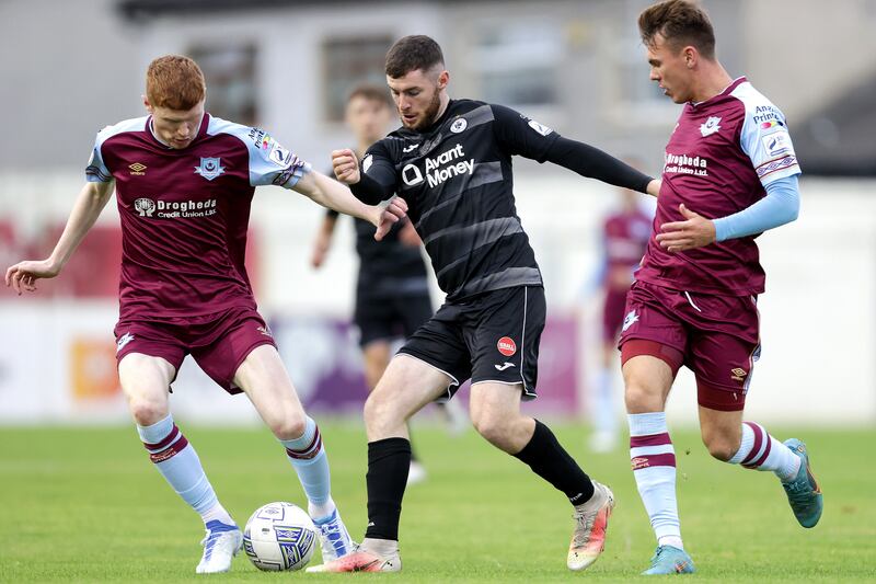 Sligo Rovers' Aidan Keena with Darragh Nugent and Dayle Rooney of Drogheda United. Photograph: Laszlo Geczo/Inpho