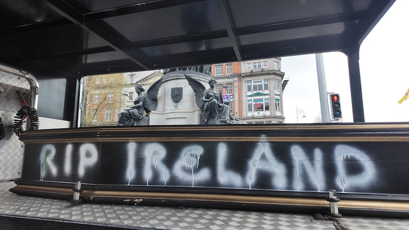 A coffin loaded on the back of a lorry at the entrance to O'Connell Street Bridge with the slogan 'RIP Ireland'. The coffin is owned by Thomas Clarke who does horse-drawn funerals. Photo: Ronan McGreevy