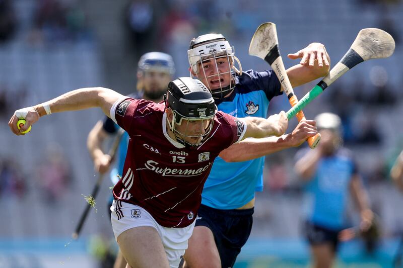 Galway's Kevin Cooney in action against Dublin's Paddy Doyle. Daithí Burke did not spare Galway harsh criticism for their first-half performance. And he was right. Photograph: Ben Brady/Inpho 