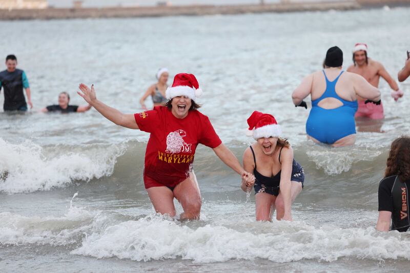Amy Alperin (left) and Shannon Levine make a splash in Sandtcove. Photograph: Bryan O’Brien
