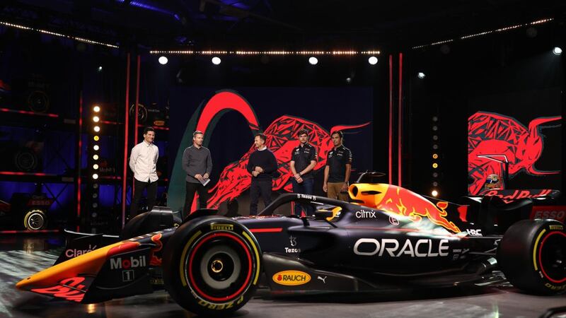 Red Bull Racing team principal Christian Horner talks on stage with  drivers Max Verstappen and Sergio Perez during the launch of the  RB18  in Milton Keynes on Wednessday. Photograph: Bryn Lennon/Getty Images