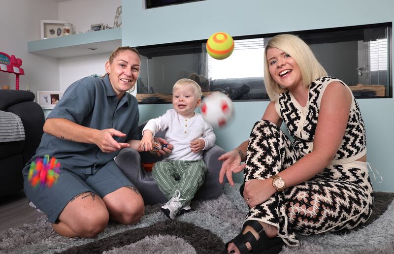 Tammy Murphy and Leanne Doyle with their two-year-old son Theo. Photograph: Dara Mac Dónaill 










