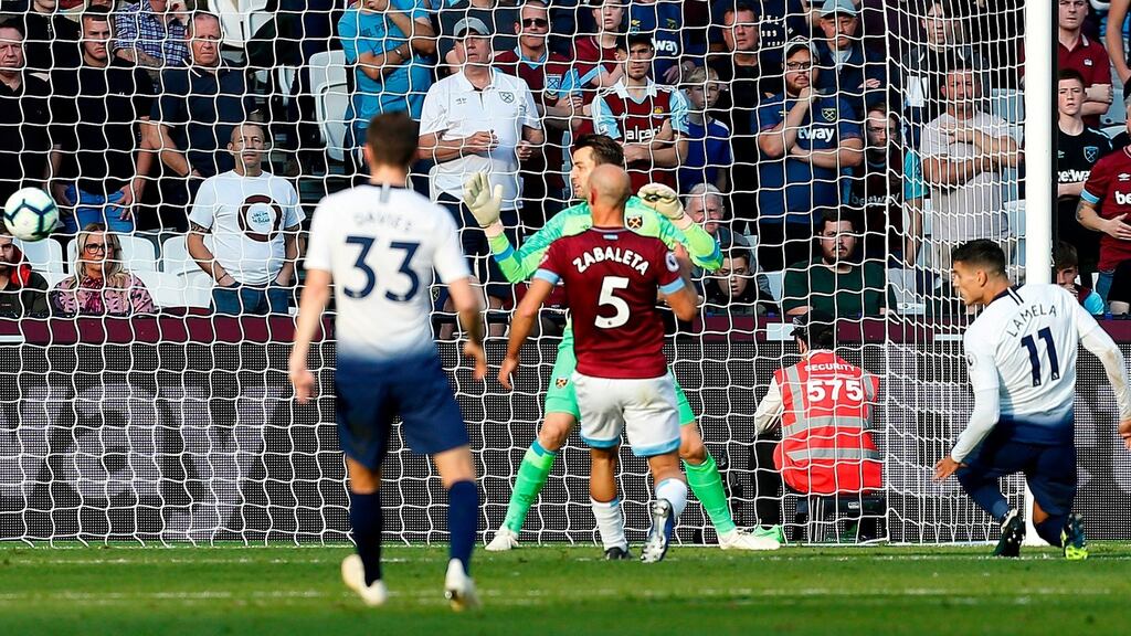 Tottenham Hotspur’s Erik Lamela heads home the opening goal in the Premier League match against West Ham at the London Stadium. Photograph: Ian Kington/AFP/Getty Images