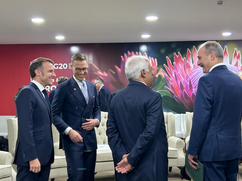 Taoiseach Micheál Martin, right, speaks with other world leaders at G20 Summit in South Africa.