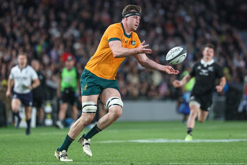 Australia's Nick Frost passes the ball against New Zealand. Photograph: Shane Wenzlick/Getty      