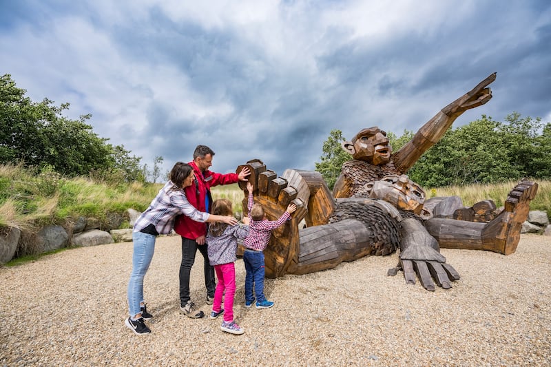Nowanois, one of three giant sculptures by artist Thomas Dambo in the Sperrins, points the way in Glenelly valley