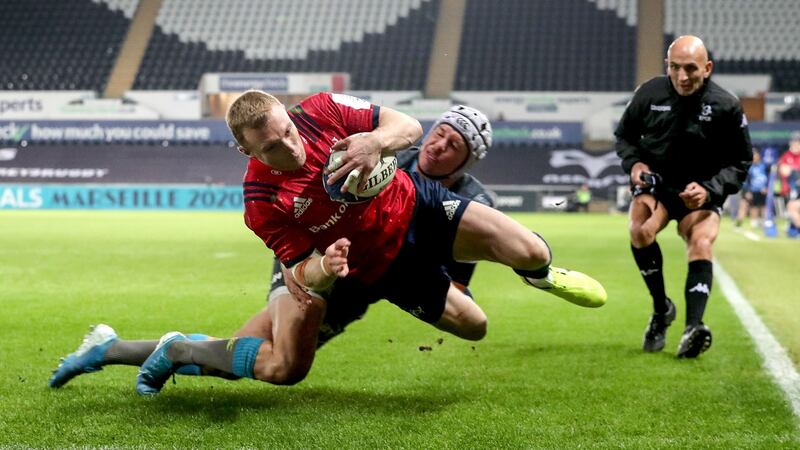 Munster’s Keith Earls scores a try in the corner in the Heineken Champions Cup match against the Ospreys at the  Liberty Stadium in  Swansea. Photograph: Dan Sheridan/Inpho