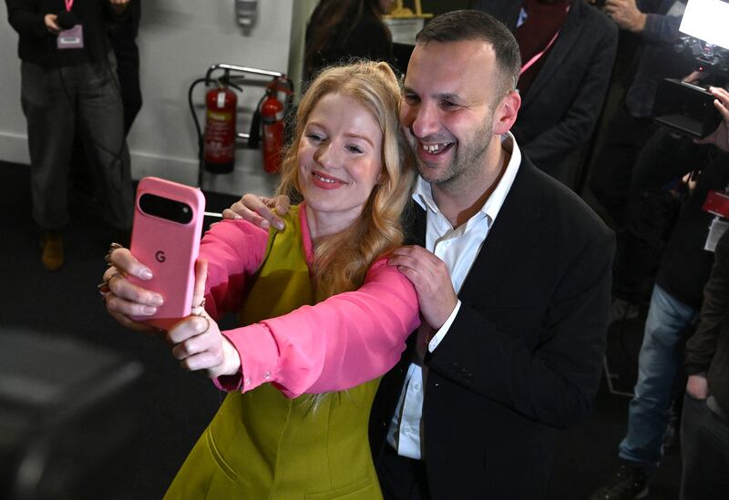 The Green Party's newest MP Hannah Spencer poses for a selfie with Zack Polanski after winning the Gorton and Denton parliamentary by-election last February. Photograph: Paul Ellis/AFP/Getty Images