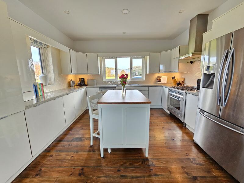 The kitchen is off the open-plan living and dining area