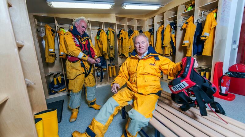 Baltimore lifeboat: coxswain Kieran Cotter and crew member Ronnie Carthy gear up for a call-out. Photograph: Michael Mac Sweeney/Provision