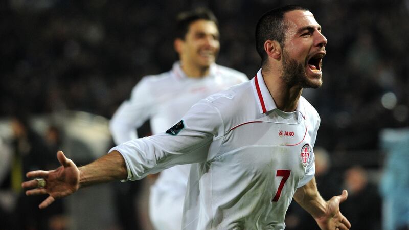 Georgia’s Jaba Kankava  celebrates his team victory during their Euro 2012 qualifying  match against Croatia in Tbilisi on March 26, 2011. Photograph: AFP