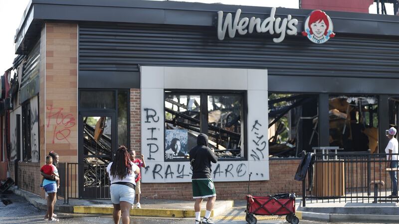 The Wendy’s restaurant, where Rayshard Brooks was shot,   was destroyed after being set fire. Photograph: Erik S. Lesser/ EPA