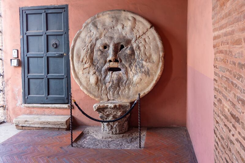 Relive a comic scene from Roman Holiday at the Mouth of Truth (Bocca della Verita).
