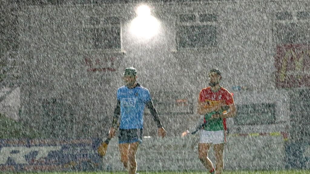Dublin’s Chris Crummy and Jack Murphy of Carlow during the Walsh Cup match at Netwatch Cullen Park in Carlow. Photograph: James Crombie/Inpho