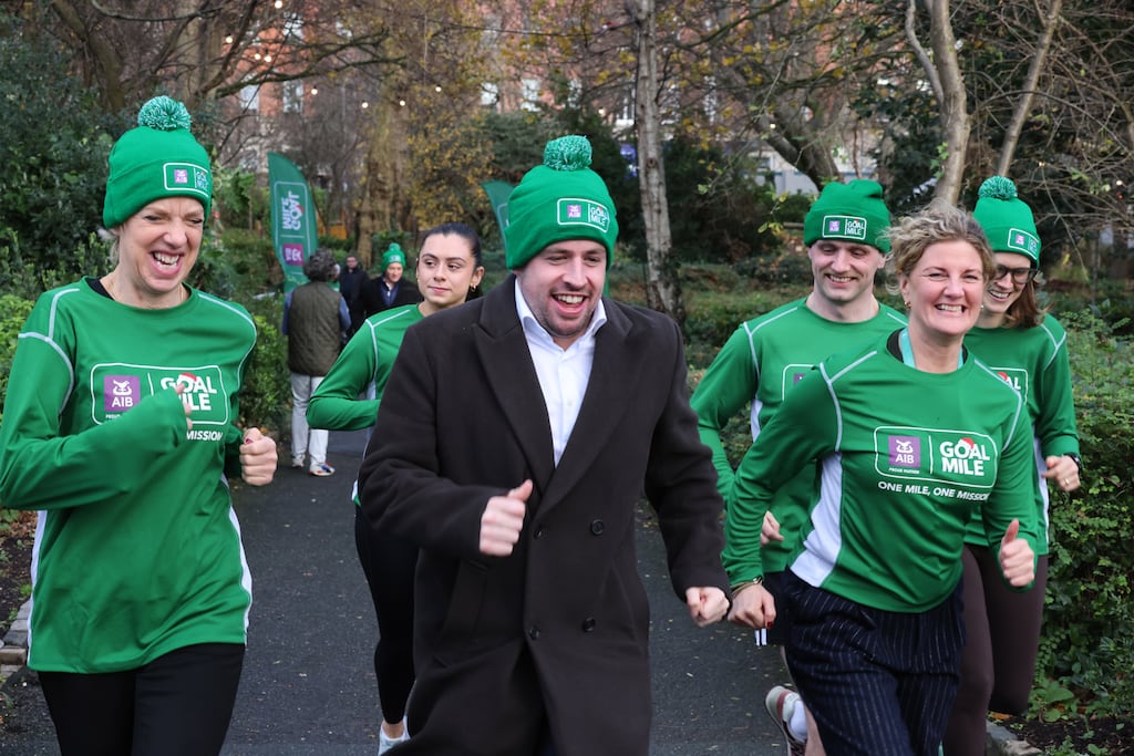 Labour Party leader Ivana Bacik and Labour TDs Conor Sheehan and Nessa Cosgrove, joined other staff during the Goal Mile which took place for up to 30 politicians and Leinster House staff around Merrion Square Park in Dublin on Tuesday. Photograph: Dara Mac Dónaill