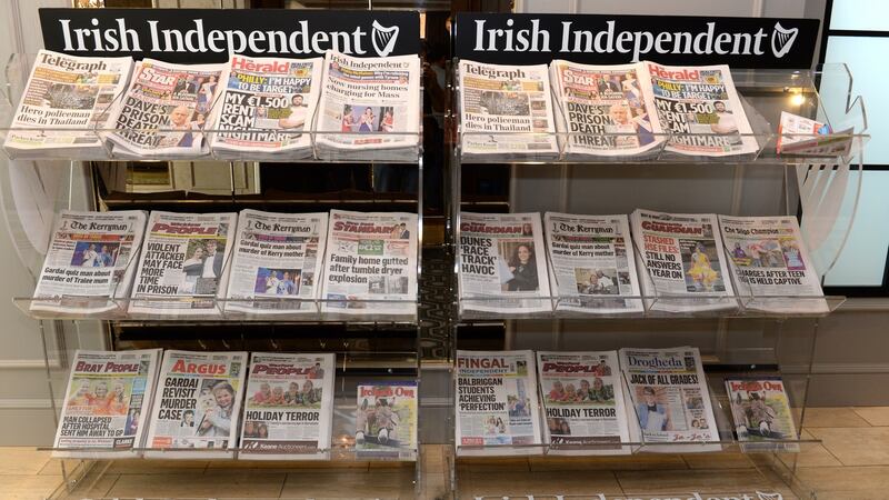 INM papers on display at the  INM AGM in Dublin. Photograph: Dara Mac Dónaill