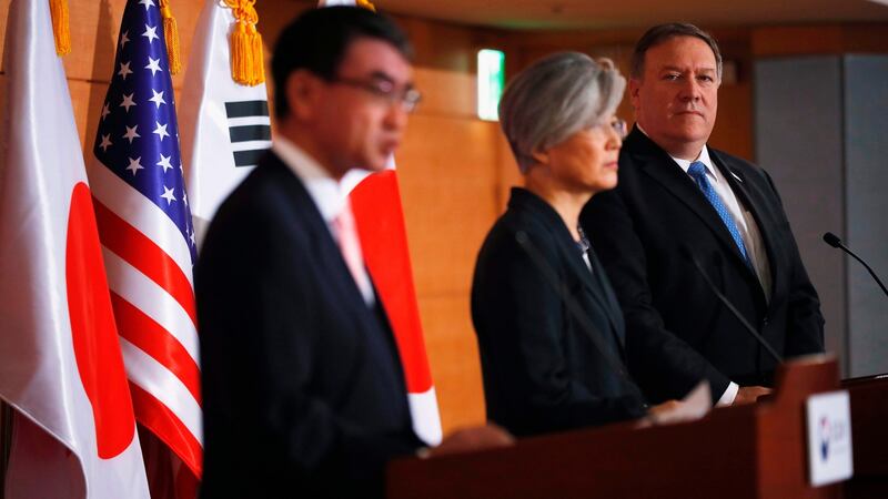 Mike Pompeo  with  South Korea’s foreign minister Kang Kyung-wha (centre) and Japan’s foreign minister Taro Kono at a joint news conference in Seoul. Photograph: Kim Hong-Ji/AFP/Getty Images