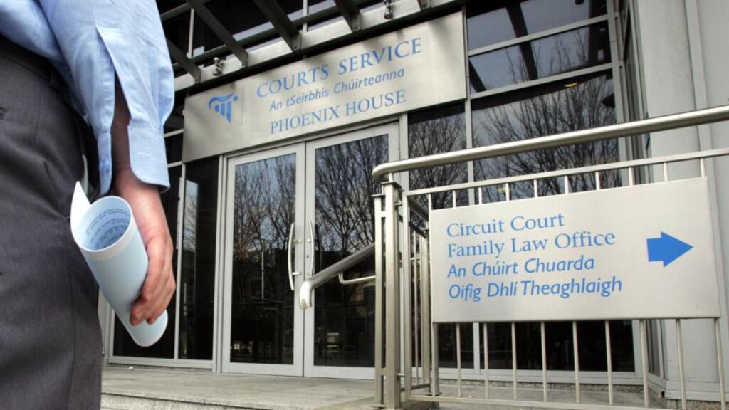 The lobby of the Dublin Circuit Family Courts, in Phoenix House Smithfield, was filled with solicitors, barristers and their clients on Monday. Unlike other courts, parties can’t sit in a family courtroom and listen to other cases while they await their own. Photograph: Cyril Byrne/The Irish Times