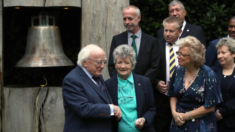 President Michael D Higgins with family members of victims of the Birmingham pub bombings, including Margaret Hambleton and her daughter Julie Hambleton.  Photograph: Brian Lawless/PA Wire