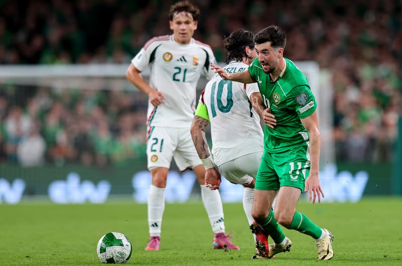 Ireland's Finn Azaz and Dominik Szoboszlai of Hungary. Photograph: Ryan Byrne/Inpho