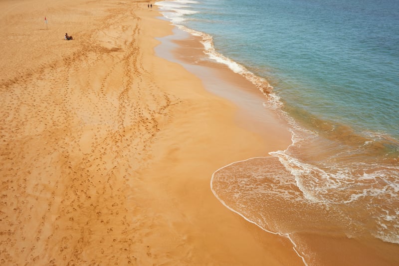 Big Beach on the Hawaiian island of Maui, in late August. The island is hosting fewer visitors than at any point since the coronavirus pandemic. Photograph: Bailey Rebecca Roberts/The New York Times
                      