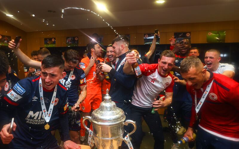 Jubilation in the St Pat's dressing room following their victory in the 2021 FAI Cup final at the Aviva Stadium. Photograph: Ryan Byrne/Inpho