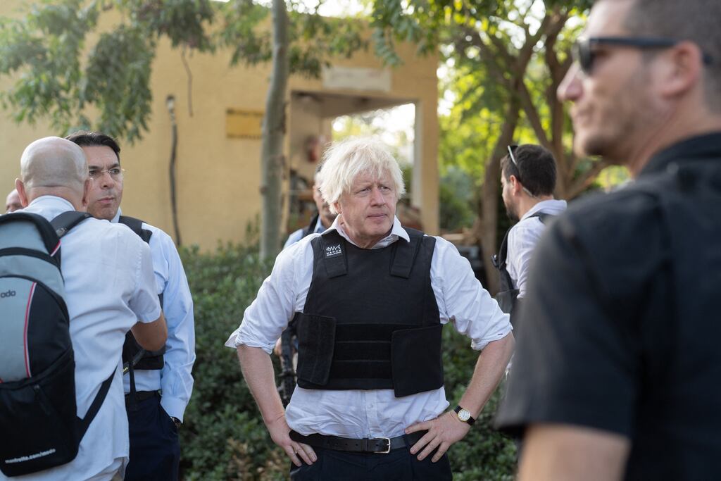 Former British prime minister Boris Johnson visits kibbutz Kfar Azza in Israel on Sunday in the wake of the Hamas terror attack of October 7th. Photograph: Dima Vazinovich/Middle East Images/AFP via Getty Images