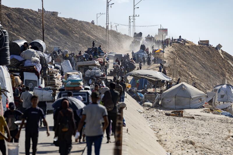 Palestinian families flee Gaza City on September 16th. Photograph: Saher Alghorra/The New York Times
                      
