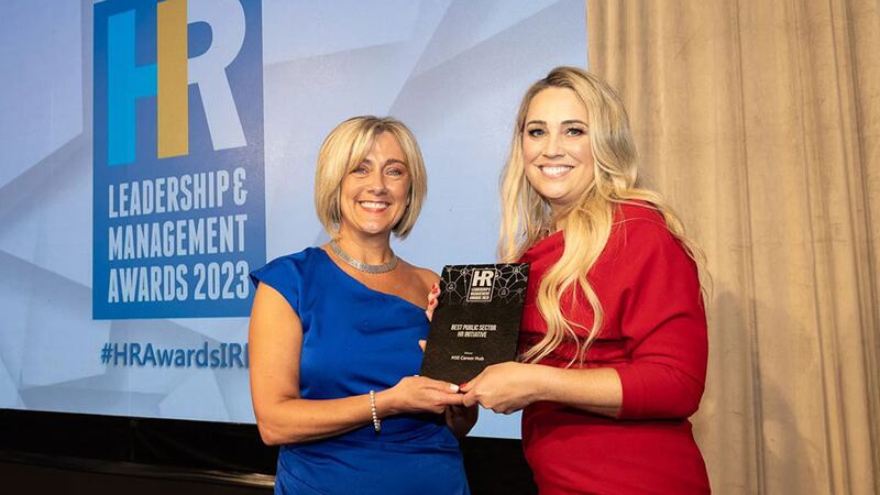 Lorraine Crawford, awards judge, presents the best public sector HR initiative award to Anne Marie Kennedy, HSE