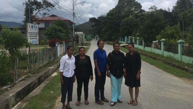 On the main road of Aileu Vila: Joaninha Vitoria of Plan International, Ludovina Mendonca of Fada, Manucasa village chief Juliana Imaculada, Lausi village chief Adelaida di Carvalho, and Augustinha Gomes Madeira also of Fada. Photograph: Darragh Murphy