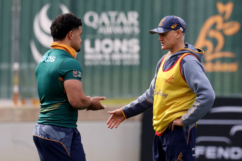Wallabies player Hunter Paisami and head coach Joe Schmidt at a training session in Sydney on July 29th. Photograph: David Gray/AFP via Getty Images          