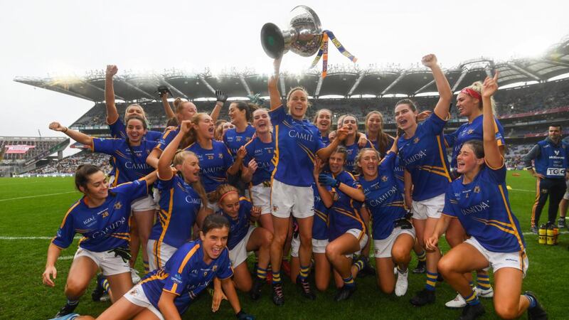 Tipperary players celebrate following the TG4 All-Ireland Ladies Football Intermediate Championship Final victory over Meath  at Croke Park. Photograph:  Stephen McCarthy/Sportsfile