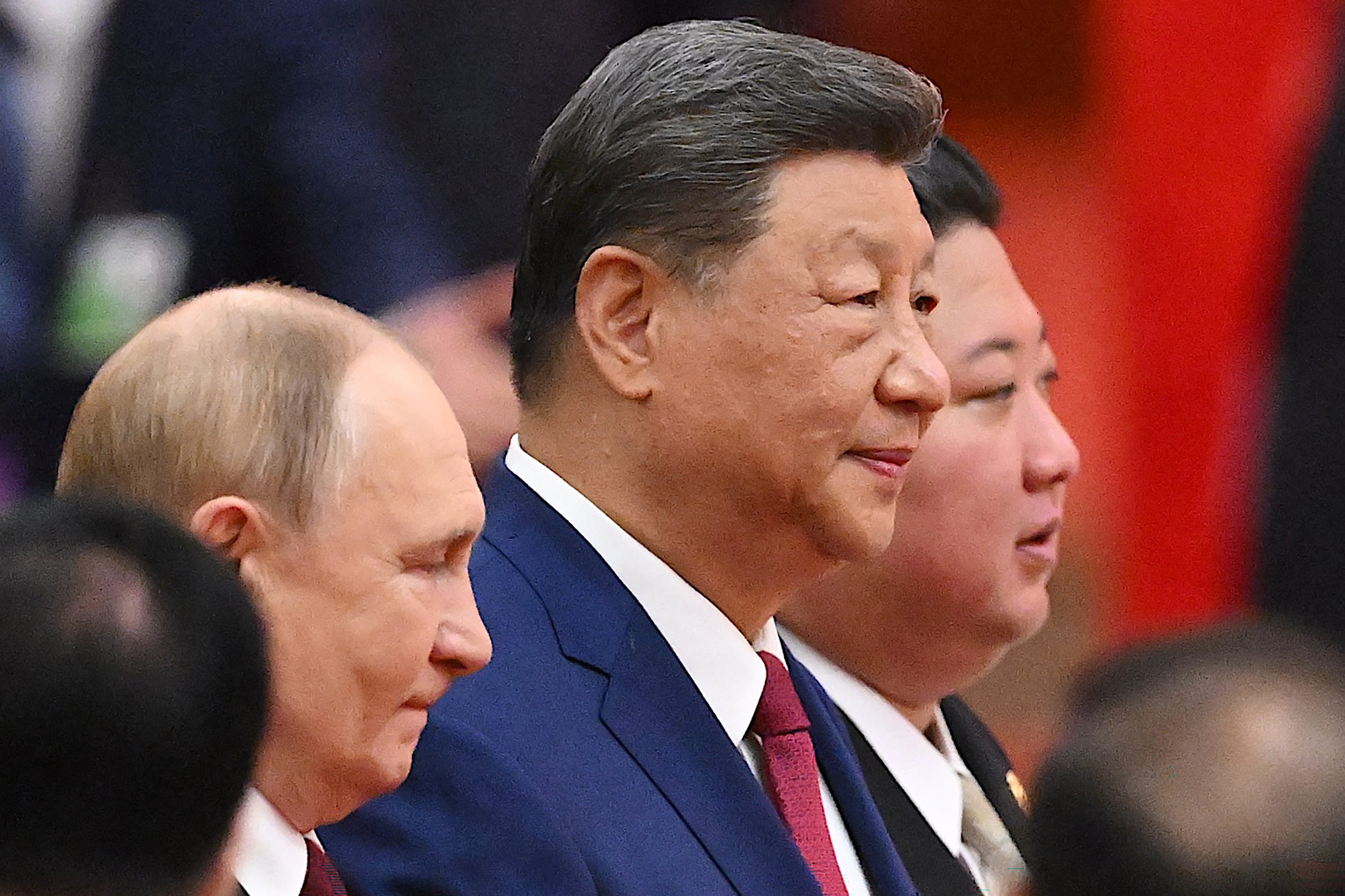 Xi Jinping warns world faces ‘peace or war’, as Putin, Kim join him for military parade