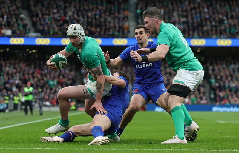 Mack Hansen of Ireland is tackled by France's Antoine Dupont during the Six Nations rugby clash at the Aviva Stadium. Photograph: David Rogers/Getty Images