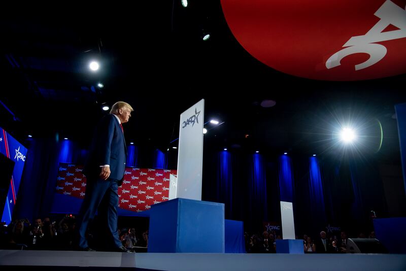 Former president Donald Trump walks onto the stage during CPAC 2022 in Dallas, Texas. Photograph: Emil Lippe/The New York Times