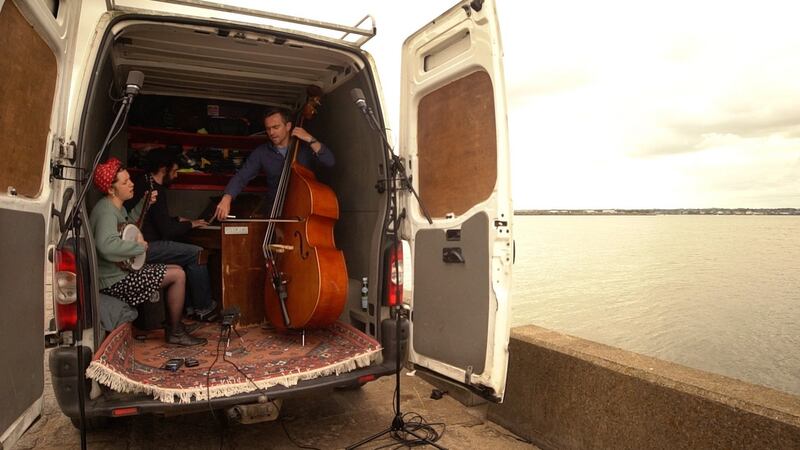 Lisa O’Neill  performing in the back of a van on the docks